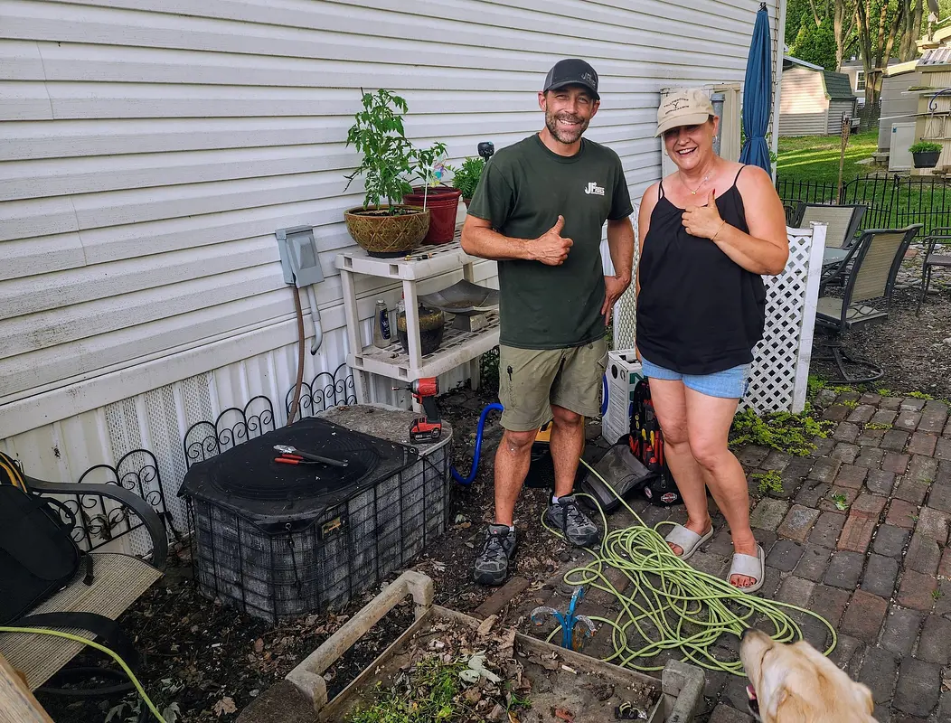 Gutter and Air Conditioner Repaired for a Bay City Woman